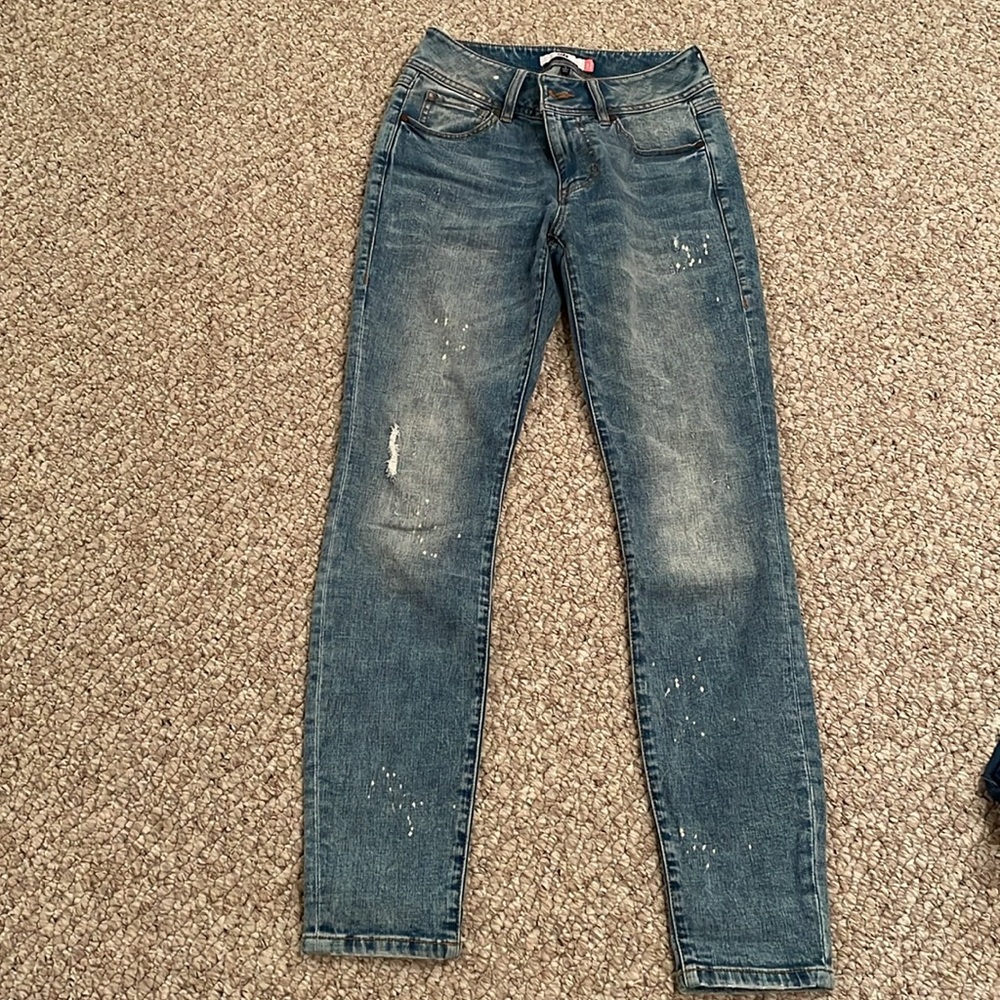 Cabi style #5492. Cinch skinny lightly distressed